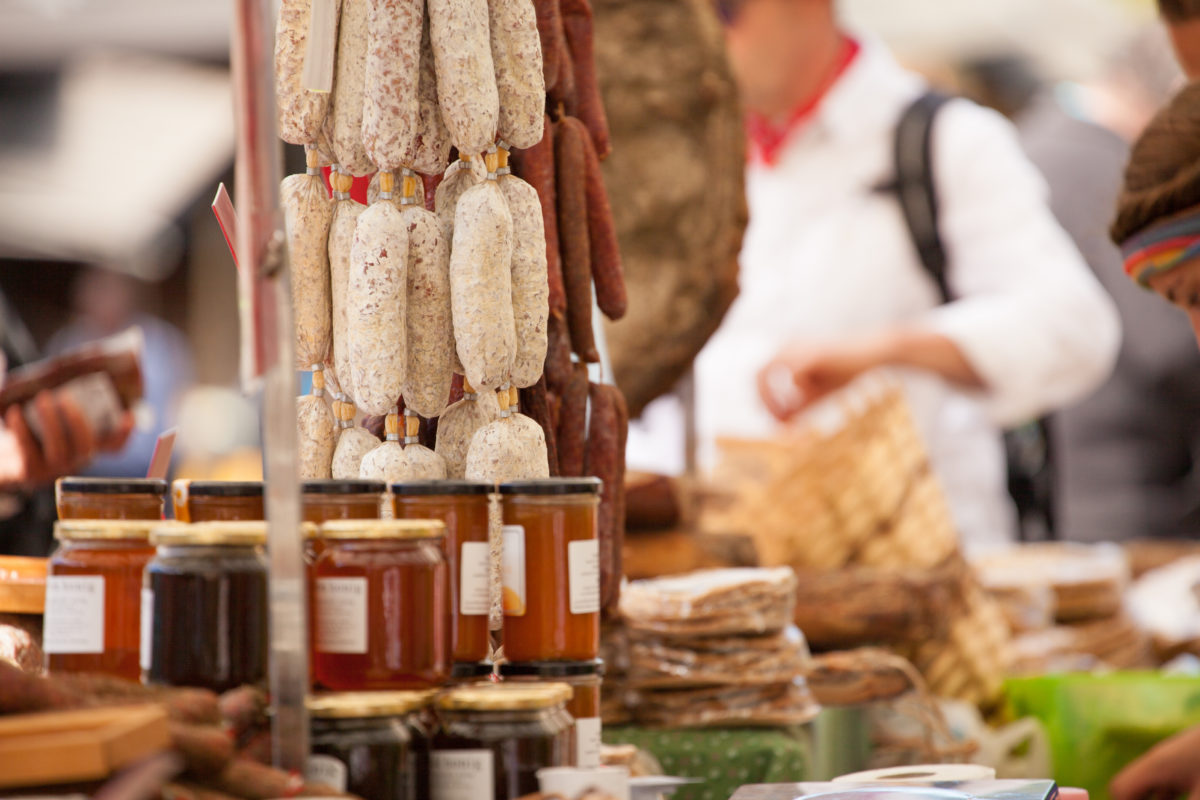 typical food market stall during an autumn local celebration in Val di Funes ( South Tyrol )