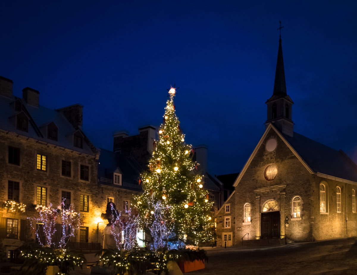 Place Royale (Royal Plaza) and Notre Dame des Victories Church decorated for Christmas at night - Quebec City, Canada