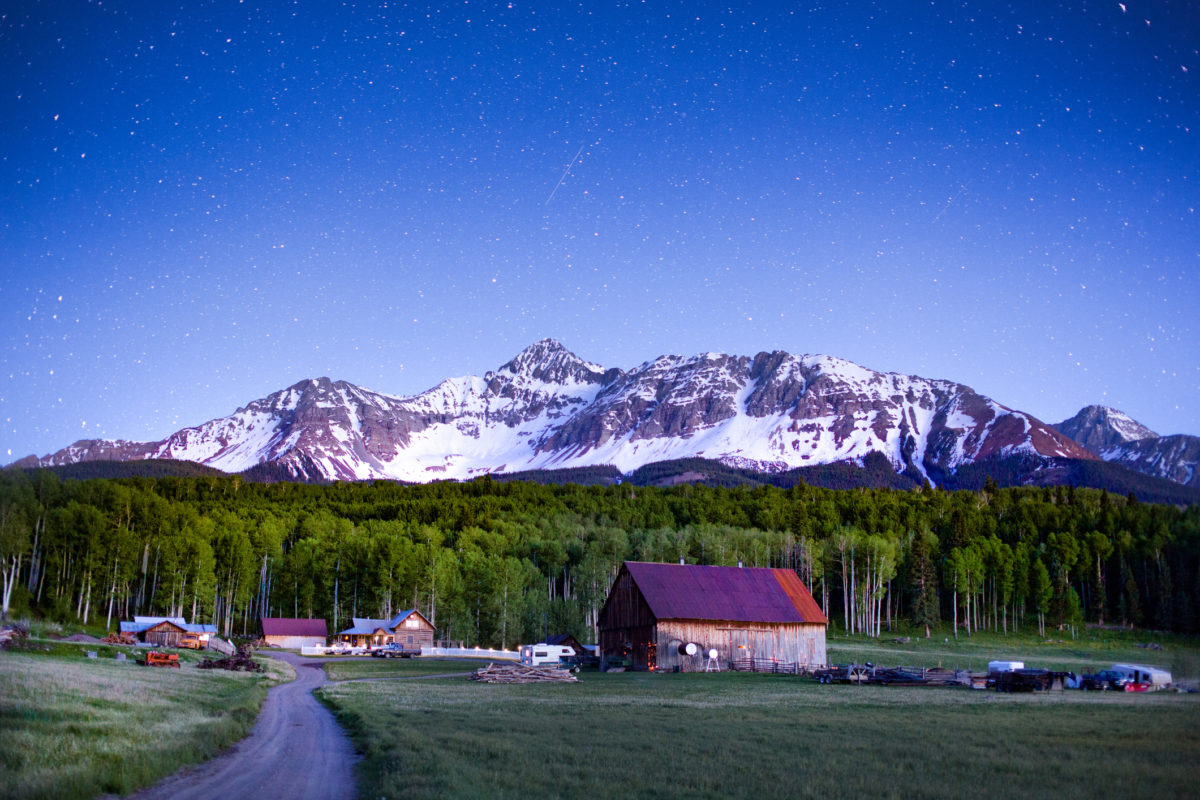 Ranch at the foot of Wilson Peak in southwest Colorado near Telluride at night with stars in the sky Creativecontentbrief 603439743